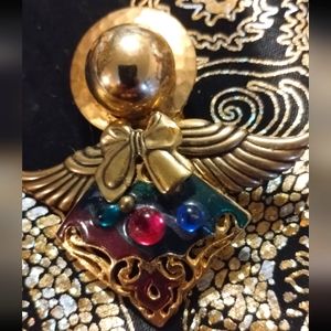 Extraordinarily beautiful vintage golden multi-colored angel brooch